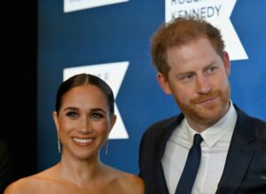 prince-harry-wife-meghan-markle-were-involved-near-catastrophic-car-chase-involving-paparazzi.jpg