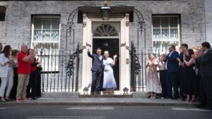 0_New-Prime-Minister-Andy-Burnham-with-his-wife-Marie-France-van-Heel-outside-10-Downing-Street-London-after-meeting-King.jpg
